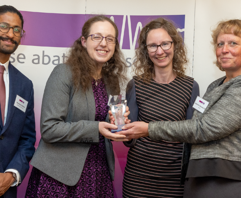 Jennie Bushell, Wonderseekers (middle-left), and Dr Sarah Payne, University of Surrey (middle-right) collecting their award.