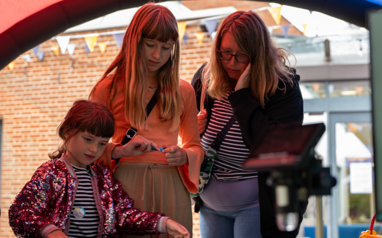 Family doing the weather watchers challenge together