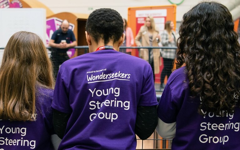 Children in the Young Steering Group wearing purple Wonderseekers t-shirts